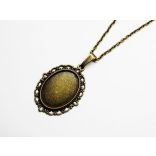 Antik bronz medál-akasztó - pöttyös