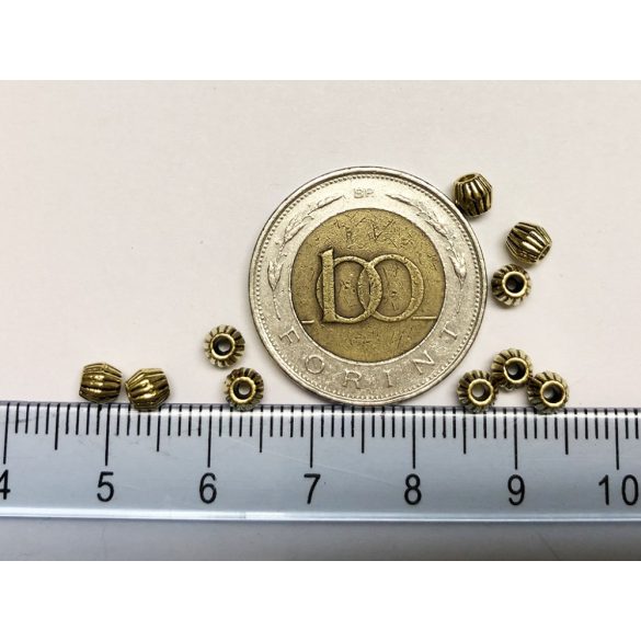 Arany színű fém köztes gyöngy 10 db (4mm) Lyuk : 1,5 mm